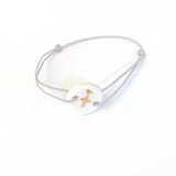 bracelet croix et coeur en porcelaine blanche sur cordon ajustable