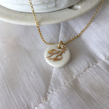 Gold Dove porcelain necklace .. Collier Colombe or en porcelaine