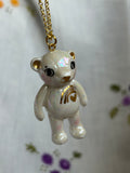 Porcelain Teddy Bear necklace with rainbow,  .. Sautoir ours en porcelaine , avec arc-en-ciel