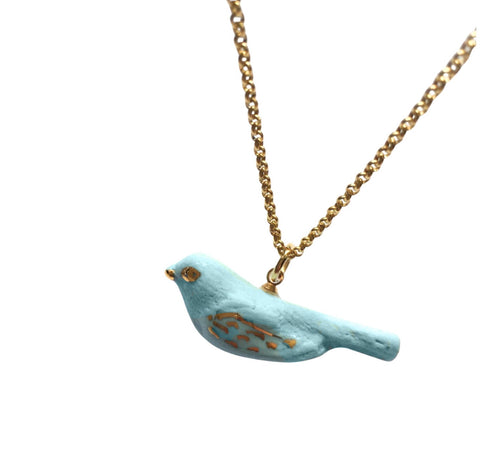 blue porcelain bird necklace .. Oiseau bleu- collier en porcelaine bleue