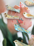 Tiny porcelaine bird necklace .. collier petit oiseau en porcelaine